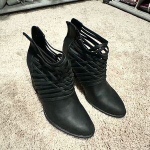 Black ankle booties with criss-cross woven design